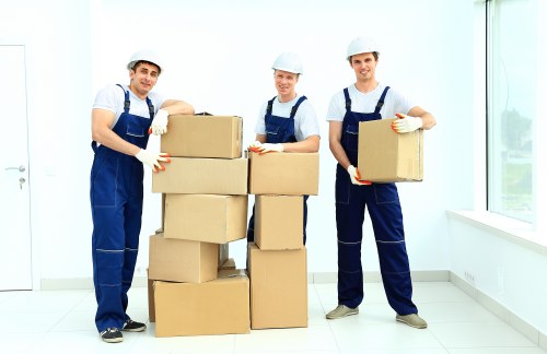 Professional office removals in Stgiles with packed furniture and moving team