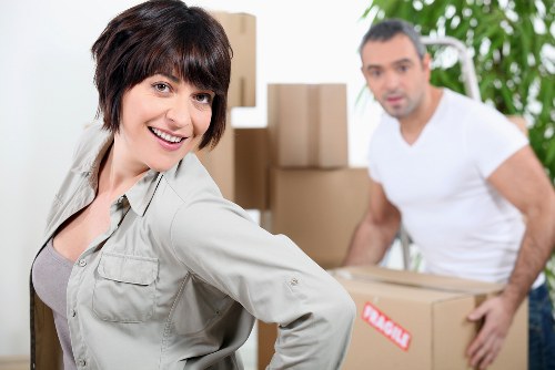 Packed moving boxes ready for flat removals in Stgiles