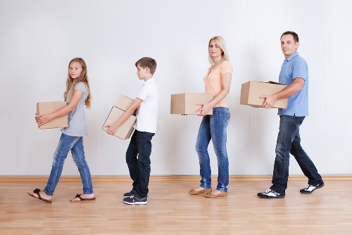 Secure self-storage unit with boxes and labelled goods