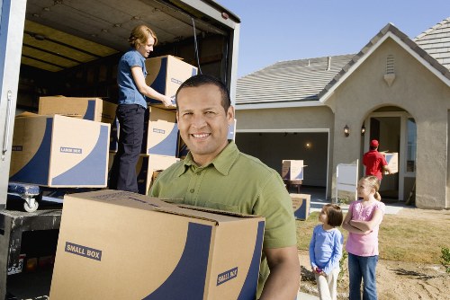 Family using household storage in Stgiles for seasonal and furniture items
